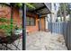 Private patio with brick wall and tile flooring at 6851 Roswell Rd # O11, Atlanta, GA 30328