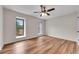 Spacious bedroom with ceiling fan and hardwood floors at 3091 Colonial Way # J3, Atlanta, GA 30341