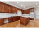 Spacious kitchen with wood cabinets and island at 4385 Hamilton Mill Rd, Buford, GA 30518