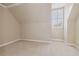 Spacious bedroom with neutral walls and carpet flooring at 4385 Hamilton Mill Rd, Buford, GA 30518