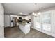 Modern kitchen with granite countertops and white cabinets at 214 Kensington Trce, Stockbridge, GA 30281