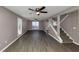 Bright living room with hardwood floors and neutral decor at 214 Kensington Trce, Stockbridge, GA 30281