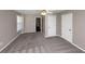 Large bedroom with ceiling fan and double closets at 214 Kensington Trce, Stockbridge, GA 30281