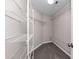 Large walk-in closet with wire shelving and carpeted flooring at 214 Kensington Trce, Stockbridge, GA 30281
