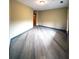 Spacious living room with hardwood floors and neutral walls at 898 Oak Sw St # 1412, Atlanta, GA 30310