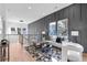 Spacious living room with gray accent wall and hardwood floors at 156 Martha Ne Ave, Atlanta, GA 30317