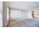Spacious living room with neutral carpeting and large windows at 2864 Holly Oaks Dr, Marietta, GA 30062
