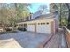 Two-story house with three-car garage and deck at 2864 Holly Oaks Dr, Marietta, GA 30062