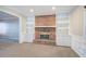 Living room with a brick fireplace and white built-ins at 2864 Holly Oaks Dr, Marietta, GA 30062