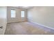 Well-lit bedroom with neutral walls and carpeted floors at 2864 Holly Oaks Dr, Marietta, GA 30062