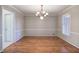 Formal dining room with hardwood floors and chandelier at 2864 Holly Oaks Dr, Marietta, GA 30062