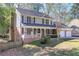 Two-story house with front porch and yard at 2864 Holly Oaks Dr, Marietta, GA 30062