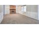 Spacious living room with fireplace and built-in shelving at 2864 Holly Oaks Dr, Marietta, GA 30062