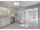 Kitchen with white cabinets, stainless steel appliances, and tile floor at 2864 Holly Oaks Dr, Marietta, GA 30062