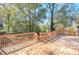Large deck with built-in bench and wooded views at 2864 Holly Oaks Dr, Marietta, GA 30062