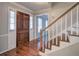 Inviting entryway with hardwood floors and staircase at 2864 Holly Oaks Dr, Marietta, GA 30062