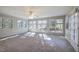 Sunroom with wall-to-wall windows and a ceiling fan at 2864 Holly Oaks Dr, Marietta, GA 30062