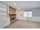 Living room featuring a brick fireplace and built-in shelving at 2864 Holly Oaks Dr, Marietta, GA 30062