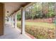 Large backyard with wooded area and playset at 1391 Arbor Hill Ct, Lawrenceville, GA 30045