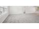 Living room with gray carpeting and neutral walls at 102 Rocky Branch Way, Villa Rica, GA 30180