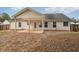 House with covered patio and fenced backyard at 102 Rocky Branch Way, Villa Rica, GA 30180