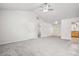 Spacious living area with high ceiling, fireplace and access to kitchen at 102 Rocky Branch Way, Villa Rica, GA 30180