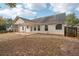 House with covered patio and fenced backyard at 102 Rocky Branch Way, Villa Rica, GA 30180