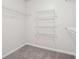 Walk-in closet with wire shelving, providing ample storage space at 102 Rocky Branch Way, Villa Rica, GA 30180