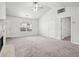 Living room with vaulted ceiling, fireplace, and access to other rooms at 102 Rocky Branch Way, Villa Rica, GA 30180