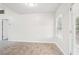 Simple dining area with tile flooring and large window at 102 Rocky Branch Way, Villa Rica, GA 30180