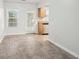 Bright dining area with tile flooring and access to the backyard at 102 Rocky Branch Way, Villa Rica, GA 30180