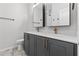 Modern bathroom with double vanity, stylish fixtures, and updated flooring at 468 Latta Ne St, Atlanta, GA 30308