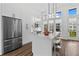 Modern kitchen with stainless steel appliances and white cabinets at 468 Latta Ne St, Atlanta, GA 30308