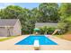 Expansive pool with diving board and basketball goal at 160 Cross Rd, Covington, GA 30016