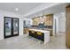 Modern kitchen with island and dark-stained cabinetry at 467 Concord Sw Rd, Smyrna, GA 30082