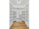 Large walk-in pantry with ample shelving for storage at 467 Concord Sw Rd, Smyrna, GA 30082