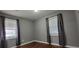 Bedroom with hardwood floors and gray walls at 8839 Hwy 166, Winston, GA 30187