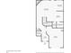 First-floor plan showing living room, dining area, kitchen, and garage at 611 Shadow Valley Ct, Lithonia, GA 30058
