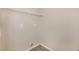 Convenient laundry room with wire shelving and tile flooring at 611 Shadow Valley Ct, Lithonia, GA 30058
