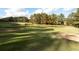 Golf course with pond and sand traps at 210 Huiet Dr, Mcdonough, GA 30252