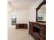 Bedroom with large dresser and wood-toned media console at 210 Huiet Dr, Mcdonough, GA 30252