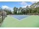 Two well-maintained tennis courts at 3373 Northumberland Pl, Roswell, GA 30075