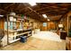 Large unfinished workshop with high ceilings and ample shelving at 2260 Wilzman Trl, Conyers, GA 30012