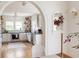 Modern white kitchen with stainless steel appliances and hardwood floors at 1214 Cameron Ne Ct, Atlanta, GA 30306