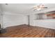 Open living room with hardwood floors and kitchen access at 3187 Kingswood Gln, Decatur, GA 30034
