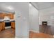 Kitchen entry with wood cabinets and hardwood floors at 3187 Kingswood Gln, Decatur, GA 30034