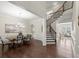 Elegant dining room with hardwood floors, chandelier, and seating for six at 323 Harvest View Ter, Woodstock, GA 30188