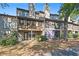 Back exterior of townhome with private patio and screened porch at 518 Gardenia Ln, Marietta, GA 30068