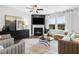 Cozy living room with fireplace and plenty of natural light at 386 Village Ln, Fairburn, GA 30213