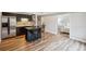 Modern basement kitchenette with stainless steel appliances and island seating at 1428 Sparkling Cove Dr, Buford, GA 30518